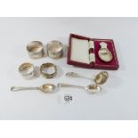 Various pieces of hallmarked silver to include a boxed caddy spoon, napkin rings, teaspoons etc,