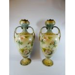 A pair of Victorian twin handled vases, marked on the base Sanford ware,