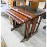 A nest of three reproduction mahogany coffee tables