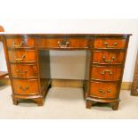 Georgian style mahogany serpentine front pedestal office desk fitted nine drawers with red tooled