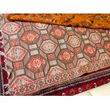 A wool pile Persian design rug 10' x 6'6