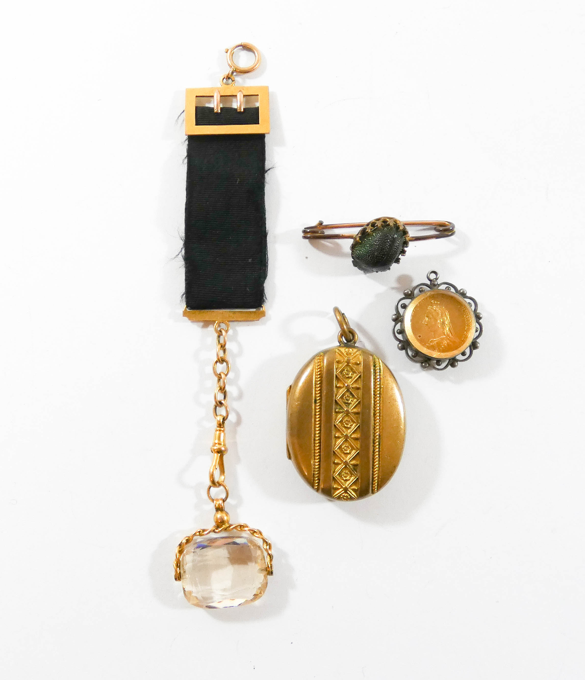 Victorian 9ct fob with faceted citrine, Victorian scarab brooch,