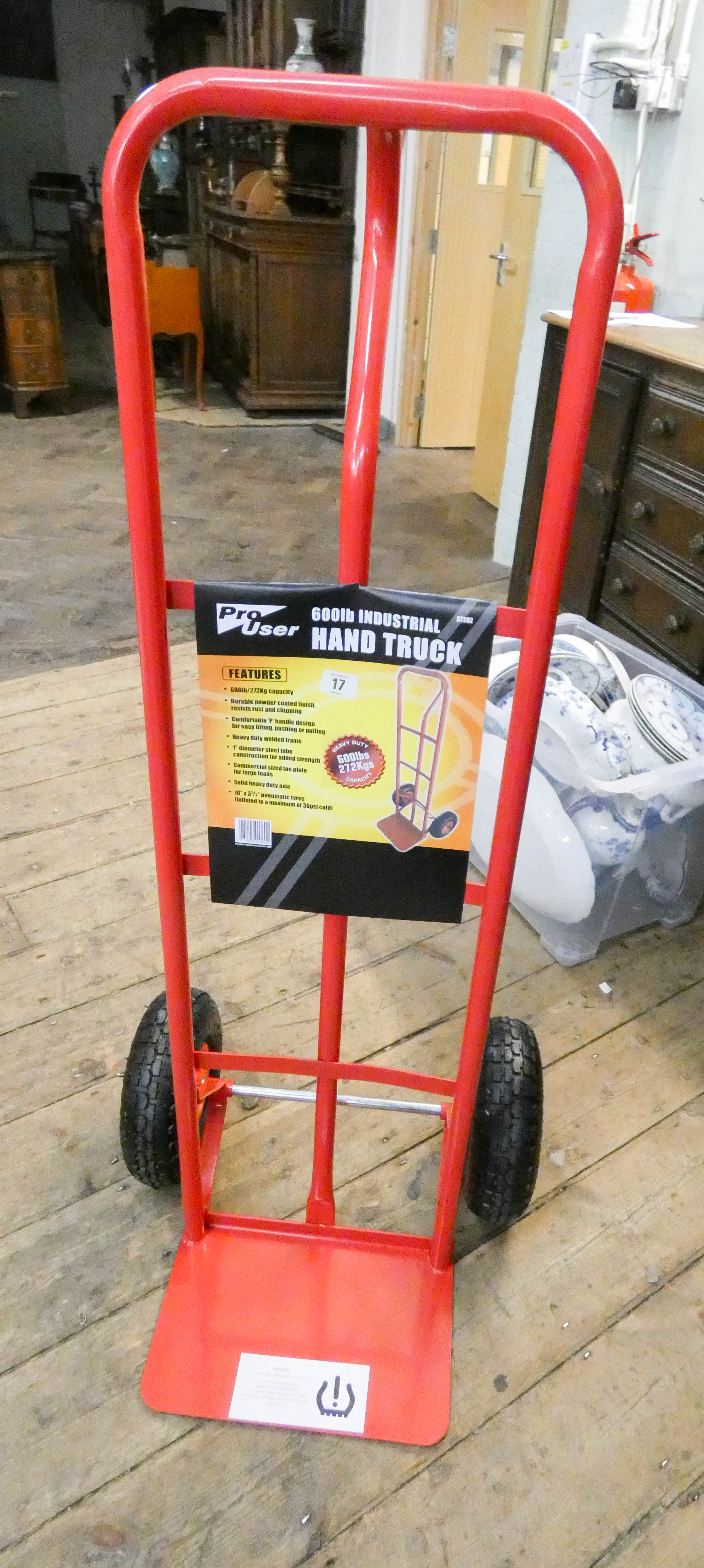 A new 600lbs work load industrial sack truck with pneumatic tires