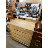 A Stag light oak dressing chest fitted four long drawers and mirror,