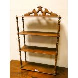 A four tier mahogany shelf unit 19" wide