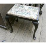 A dressing stool with tapestry seat standing on cabriole legs