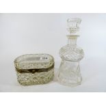 A Victorian etched glass thistle shaped decanter and a cut glass and gilt metal mounted oval