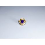 18ct gold Middle Eastern dress ring set with an oval amethyst ring size 'i'