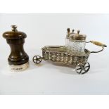A silver plated Victorian cruet set on trolley and a silver mounted salt mill