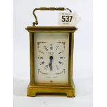 A French brass eight day carriage clock approx 11cms tall