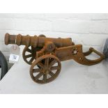 A small rusty cast iron cannon