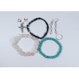 A collection of jewellery to include three beaded bracelets, three pairs of earrings,