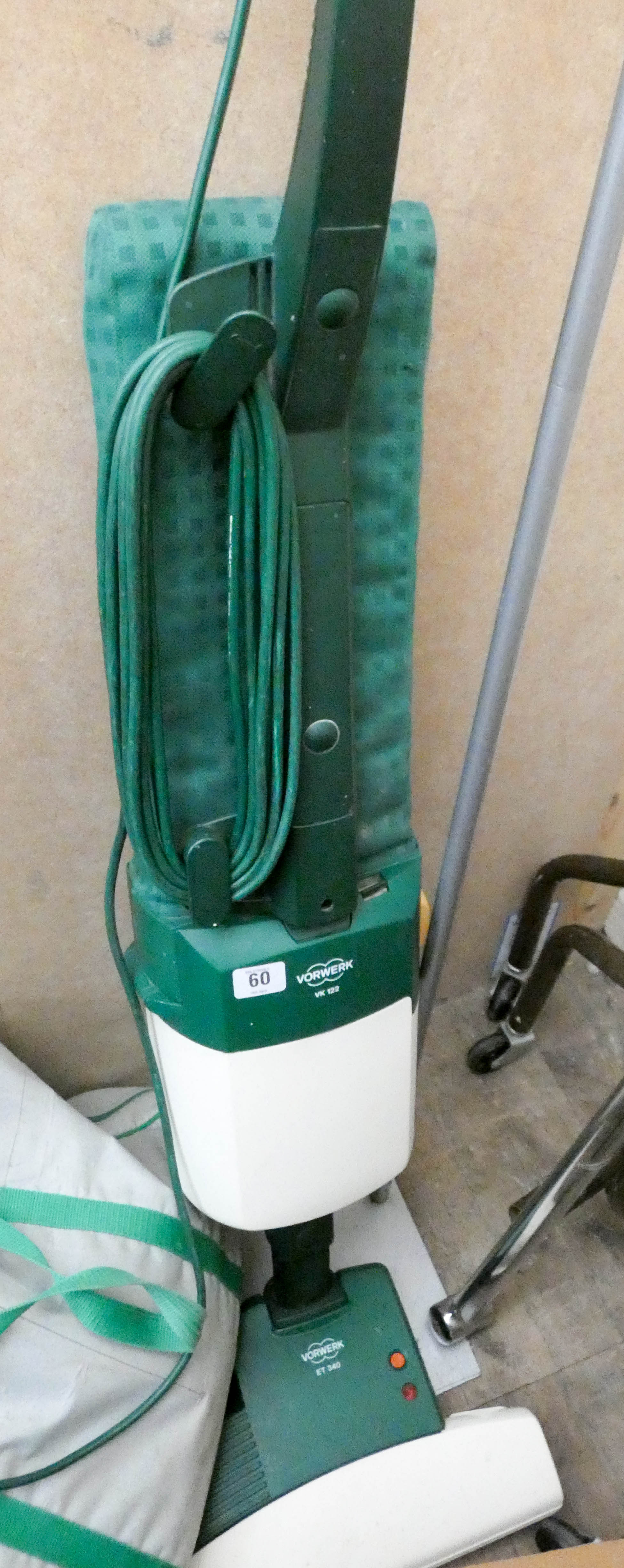 A Vorwerk upright vacuum cleaner with accessories