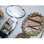 An oval wall mirror in floral decorated frame together with a frameless Deco style mirror and one