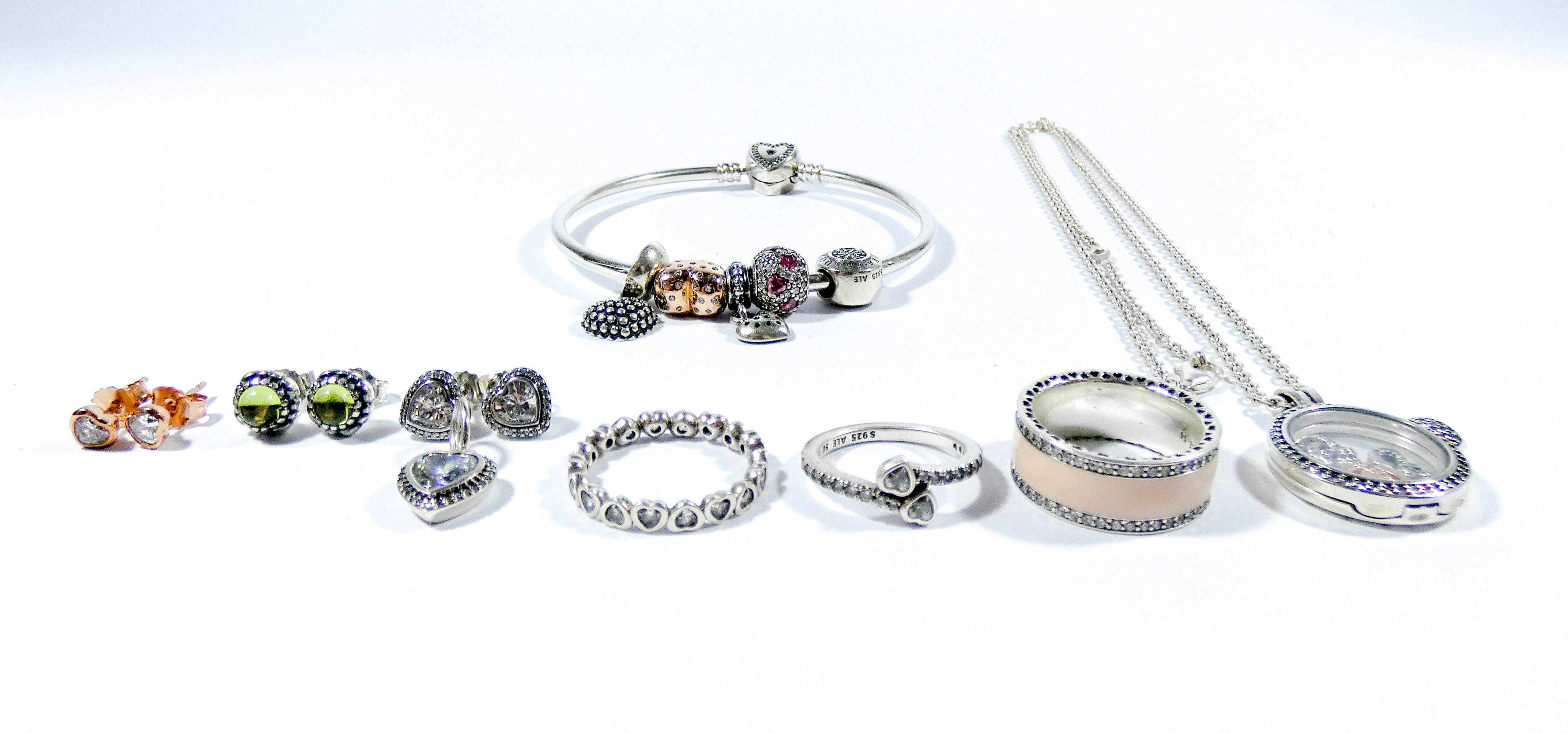 A collection of Pandora jewellery to include a floating locket necklace with four charms,