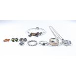 A collection of Pandora jewellery to include a floating locket necklace with four charms,