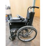 A fold up self-propelled wheelchair