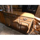 A modern Fisher radiogram in mahogany style sideboard cabinet