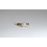 Pretty seven stone diamond daisy cluster ring, on 9ct gold shank,