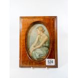 An early 20th century oak framed miniature painting on ivory depicting a seated female in a summer