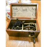 A Victorian improved magneto electric shock machine in mahogany case