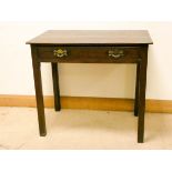 A Georgian oak hall table fitted one long drawer with brass handles on square shaped legs 32" wide