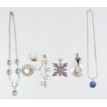 A collection of silver jewellery - mother of pearl set pendants,