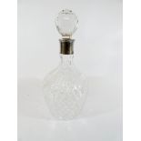 A cut glass and sterling silver mounted liqueur decanter,