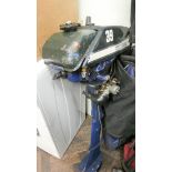 An Archimedes Penta small outboard motor,