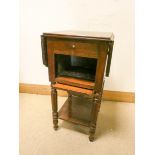 A small French mahogany Pembroke style drop leaf table with drawer and pull out workbox under on