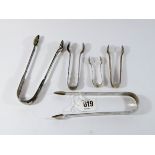 Five pairs of silver sugar tongs approx weight 5ozs