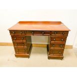 Victorian mahogany pedestal kneehole writing desk fitted nine drawers with polished top 4' wide