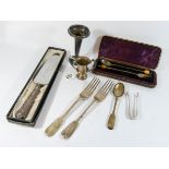 Various pieces of mixed silver to include forks, spoons, sugar tongs, trophy cup,