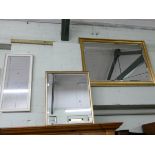A large bevelled wall mirror in gilt frame,