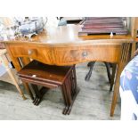 A reproduction mahogany serpentine front hall table fitted two drawers 3'6 wide