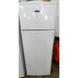 An ice King fridge freezer with small freezer compartment on top