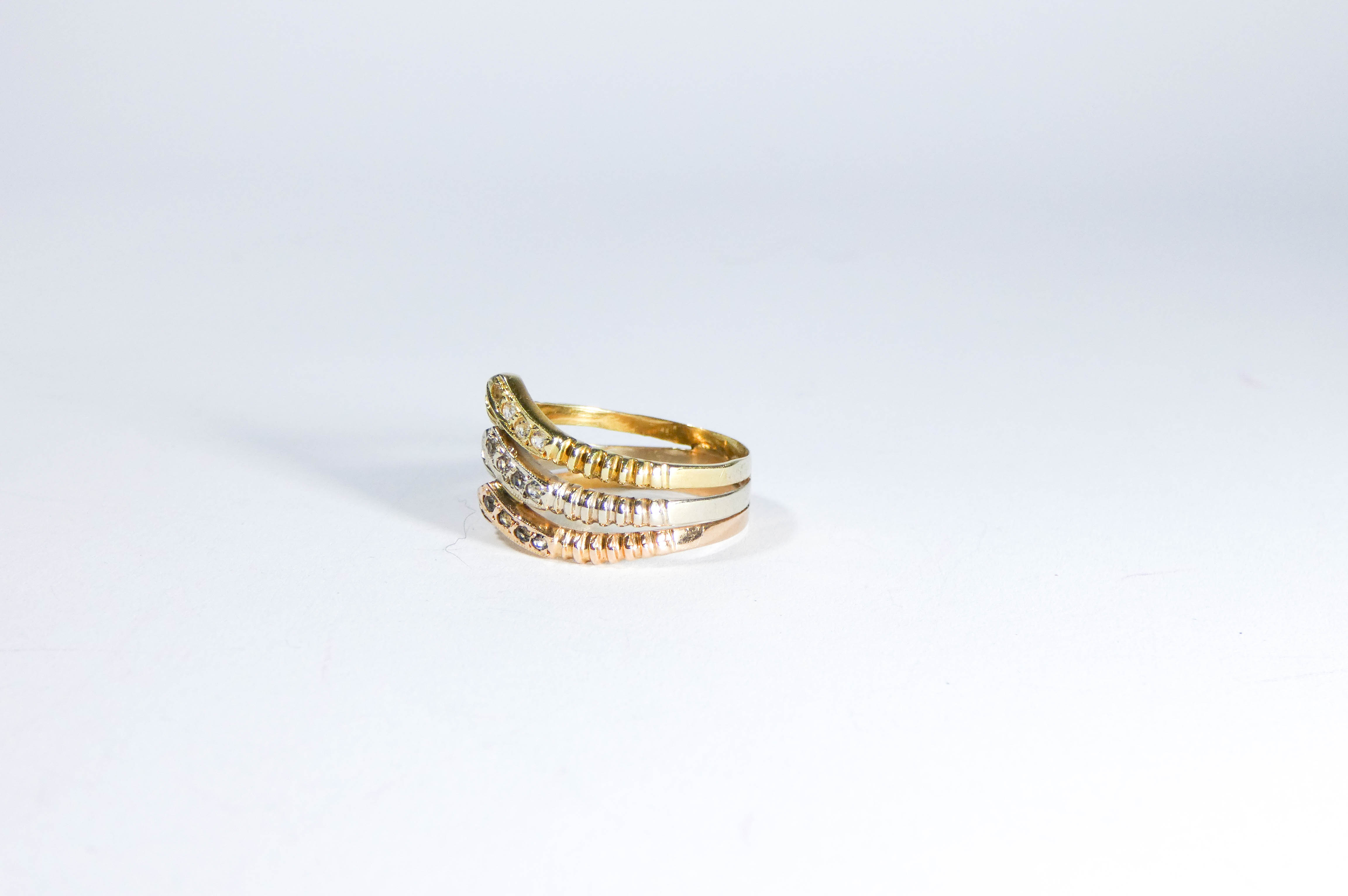 Middle Eastern tri-colour gold wishbone dress ring, set with white stones, - Image 2 of 2