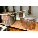 Two large copper saucepans one with lid and a copper preserve bowl