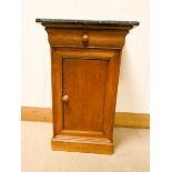 A French oak bedside cabinet fitted drawer with black effect marble top