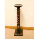 A mahogany barley twist column torchiere