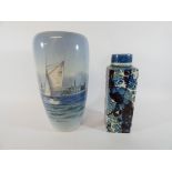 A large Royal Copenhagen vase with seascape scene and a Copenhagen Faience vase,
