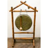Brass gong on bamboo stand with beater Brass gong is 38 cms diameter