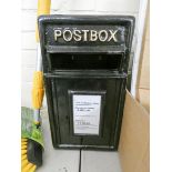 A black reproduction post box
