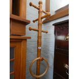 A pine hat and coat stand