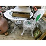 A white and green painted Victorian style circular garden table and two matching chairs