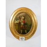A late 18th early 19th century gilt framed on tin plate oil painting depicting a boy with doves