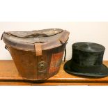 A Lincoln Bennett and company black top hat with leather carrying case together with a pair of