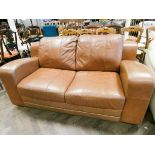 Two seater settee in soft brown leather