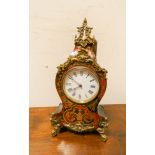 A Buhl brass mounted mantel clock with white enamel dial 12" tall