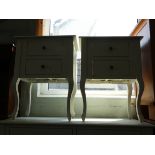 A pair of matching two drawer bedside chests on cabriole legs also matching previous lots